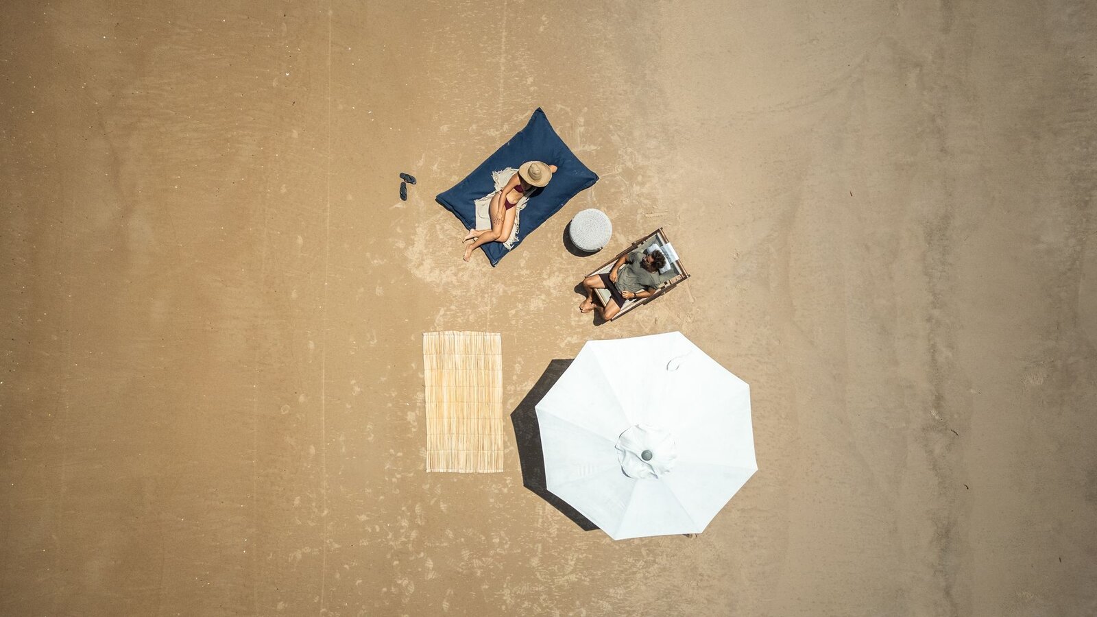 Aérea · figuras na areia
